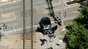Tesla struck by South Shore commuter train Hingham, Massachusetts