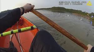 Bodycam video shows police officers save unconscious kayaker in cold  Plymouth  Massachusetts pond