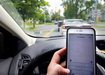 Can you go on your phone at a red light in MA